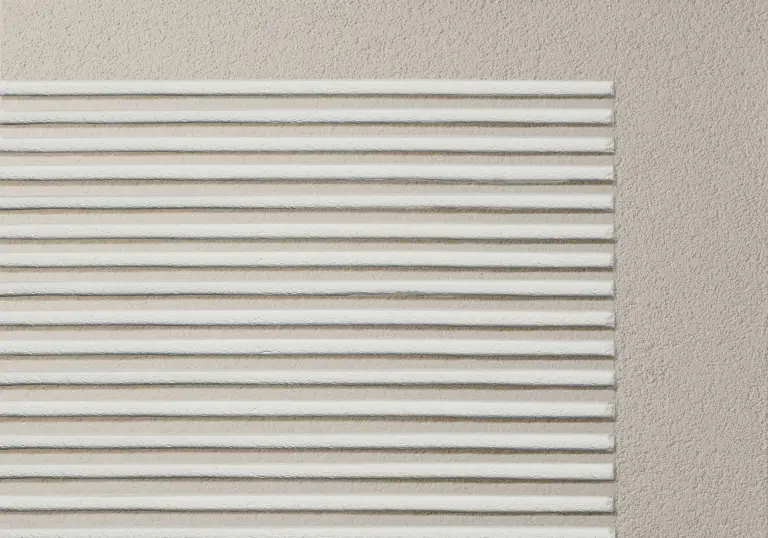 Fassadengestaltung mit Putz, Putzfassade mit StoSignature Textur beschichtet