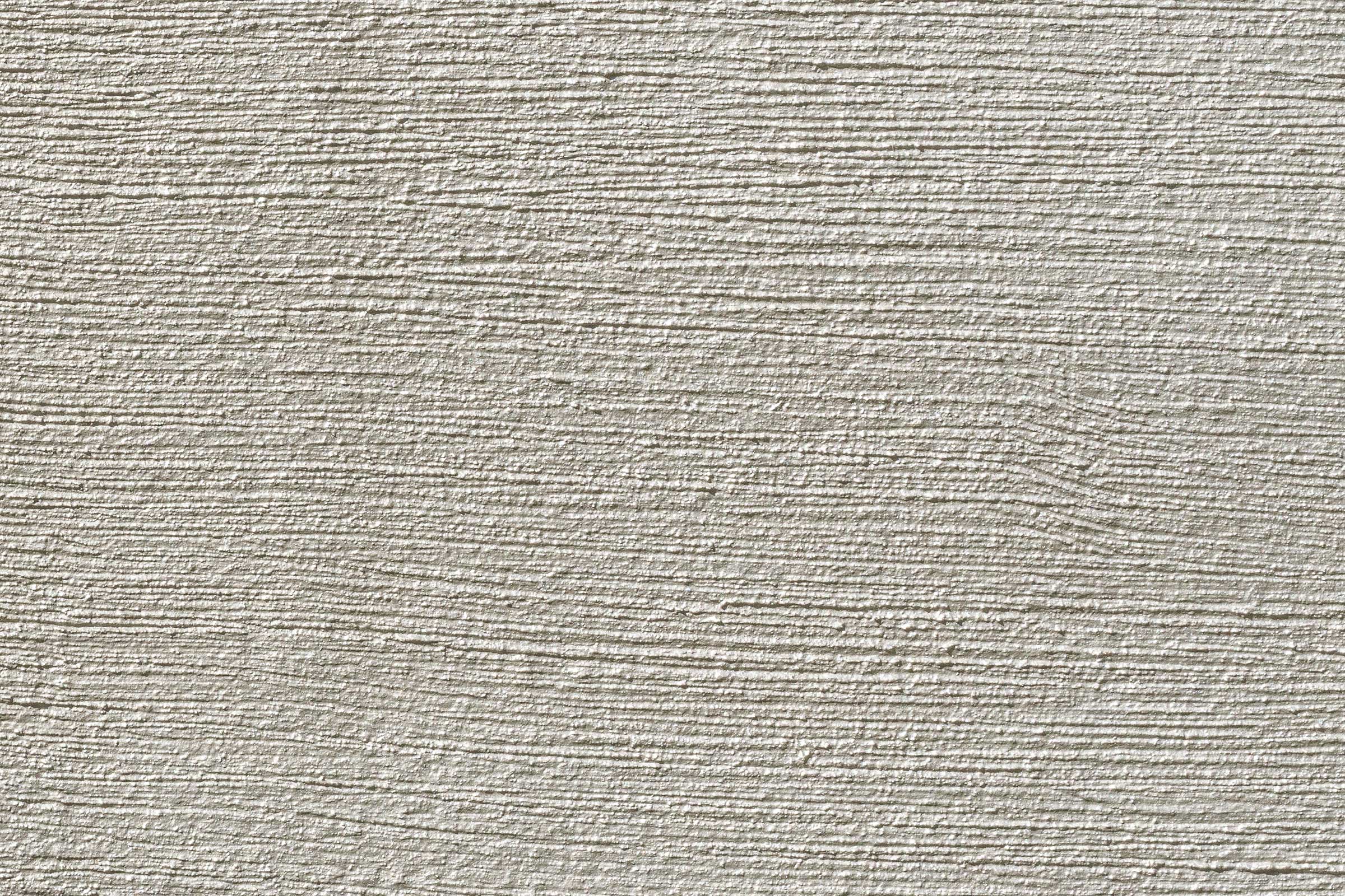 Metallische grau-braune Oberfläche, beschichtet mit der bionischen Farbe StoColor Dryonic® M