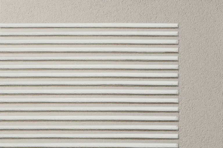 Fassadengestaltung mit Putz, Putzfassade mit StoSignature Textur beschichtet