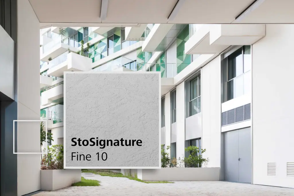 Detailaufnahme Fassade Wohnanlage: hinterlüftete Glasfassade mit StoVentec Glass und Putztexturen