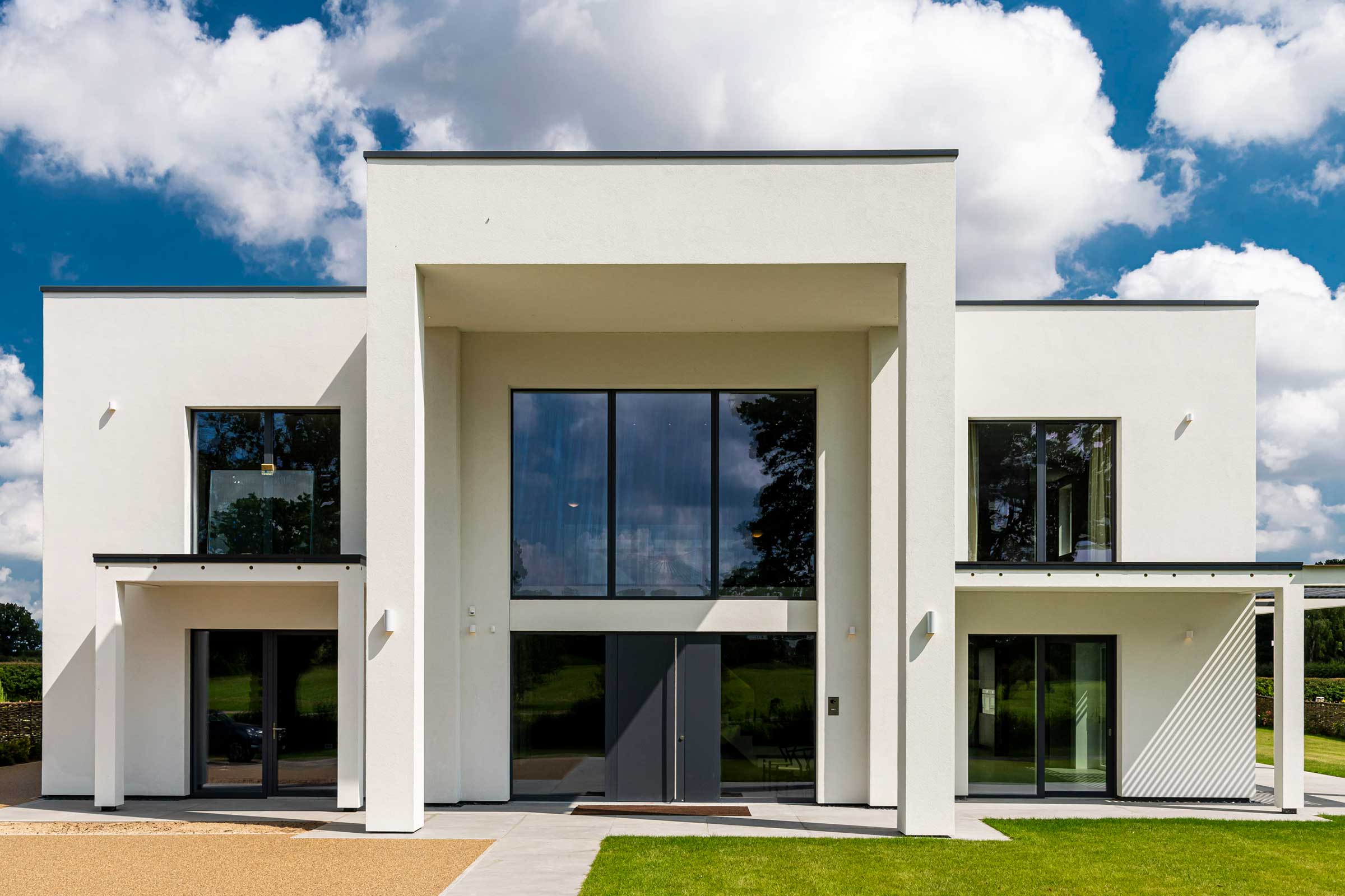 Passivhaus mit weißer Putzfassade, Fassadenputz StoSilco® Siliconharz-Oberputz