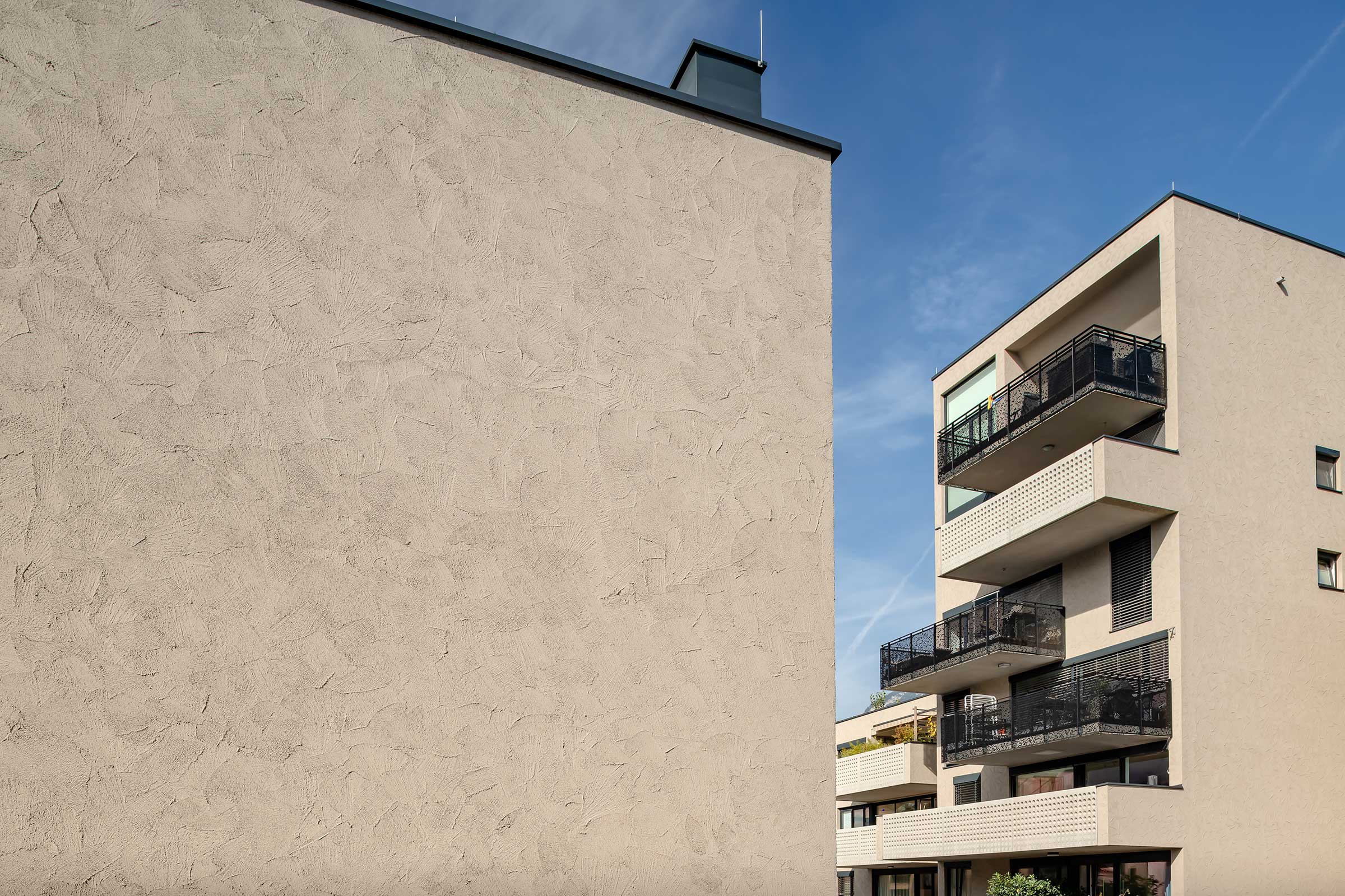 Fassadenputz mit Kellenschlag: Stolit Effect® als StoSignature Texture, Stadthäuser Innsbruck 