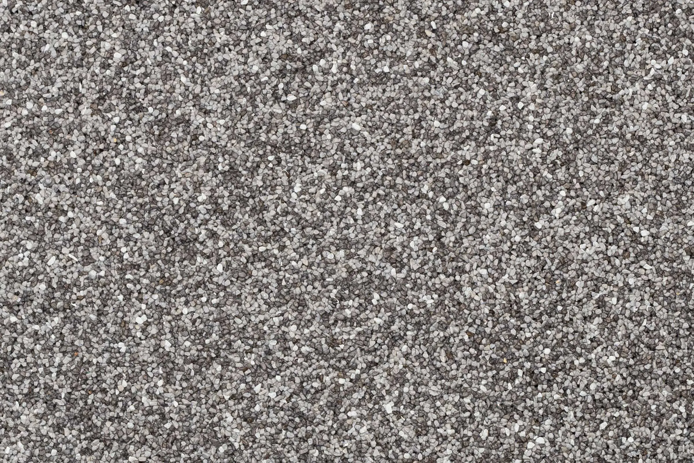 Oberfläche Buntsteinputz in Kornstärke K 1,5 StoSuperlit, Grau-weiß