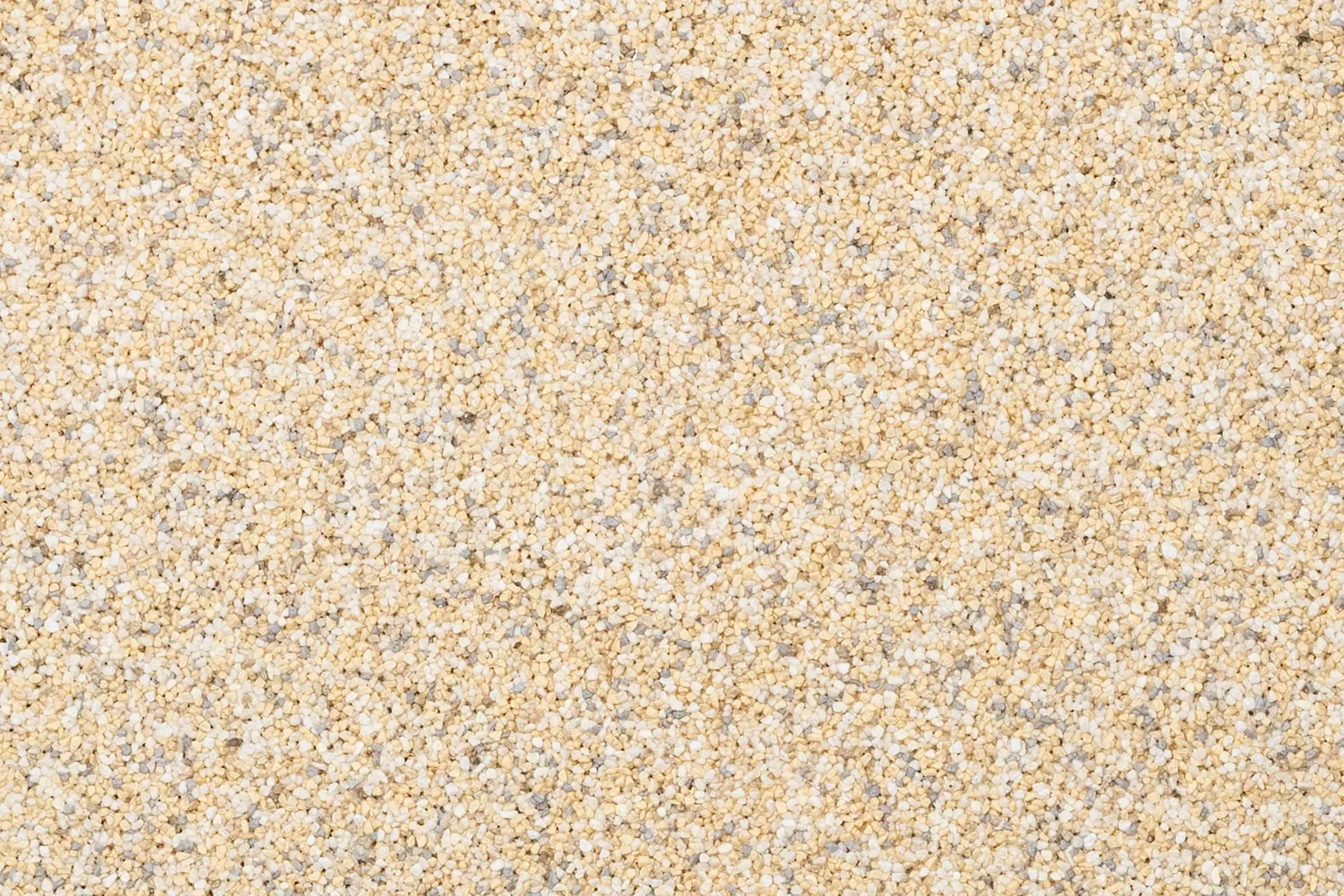 Oberfläche Natursteinputz in Kornstärke K 1,5 StoSuperlit, Beige-gellb-grau
