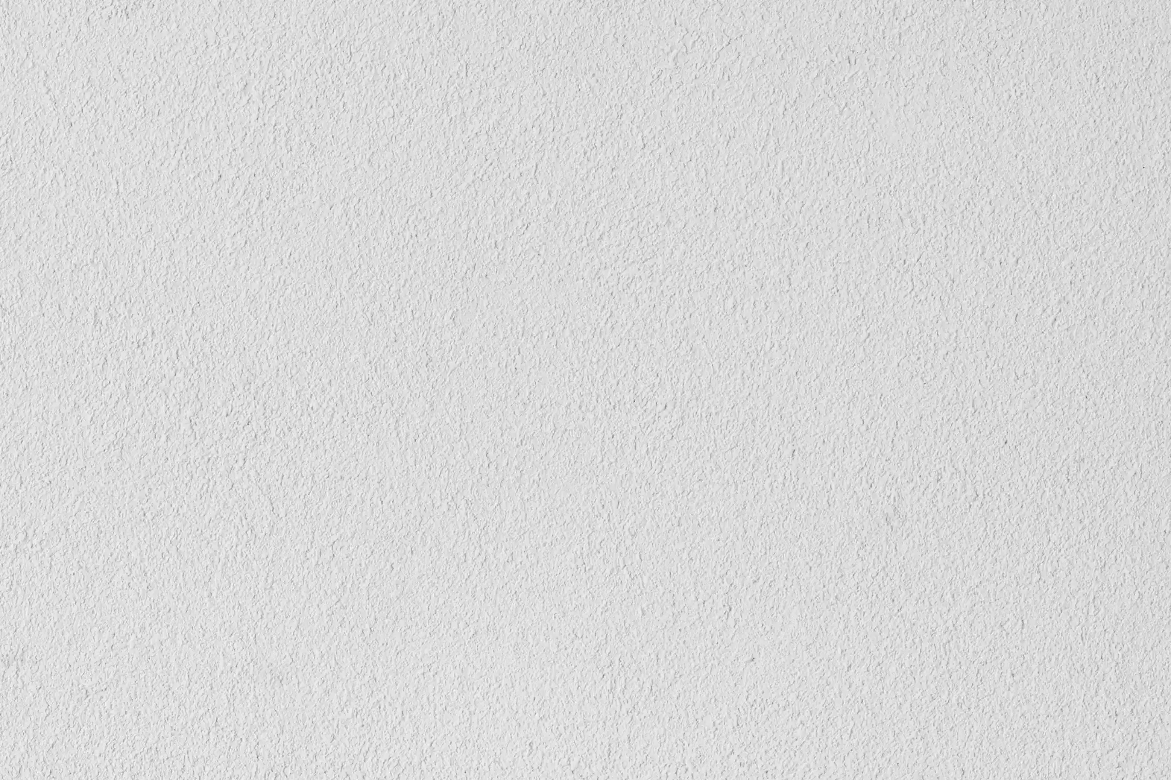 Detailaufnahme einer weißer Putzfassade gestaltet mit StoSignature