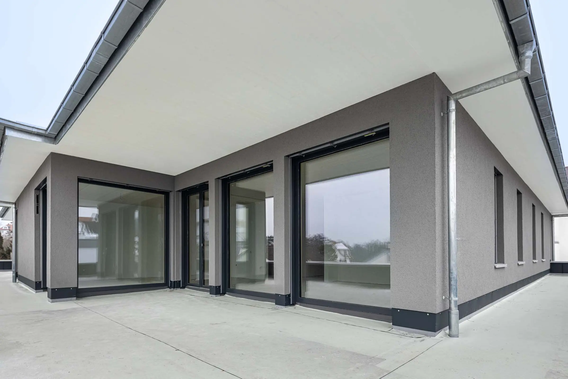 Aufnahme eines Mehrfamilienhauses, Holzbauweise gedämmt mit StoTherm Wood